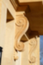 Natural stone scroll corbels
