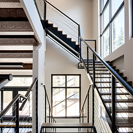 photograph focused on a set of interior architectural metal stairs in a high end northwest