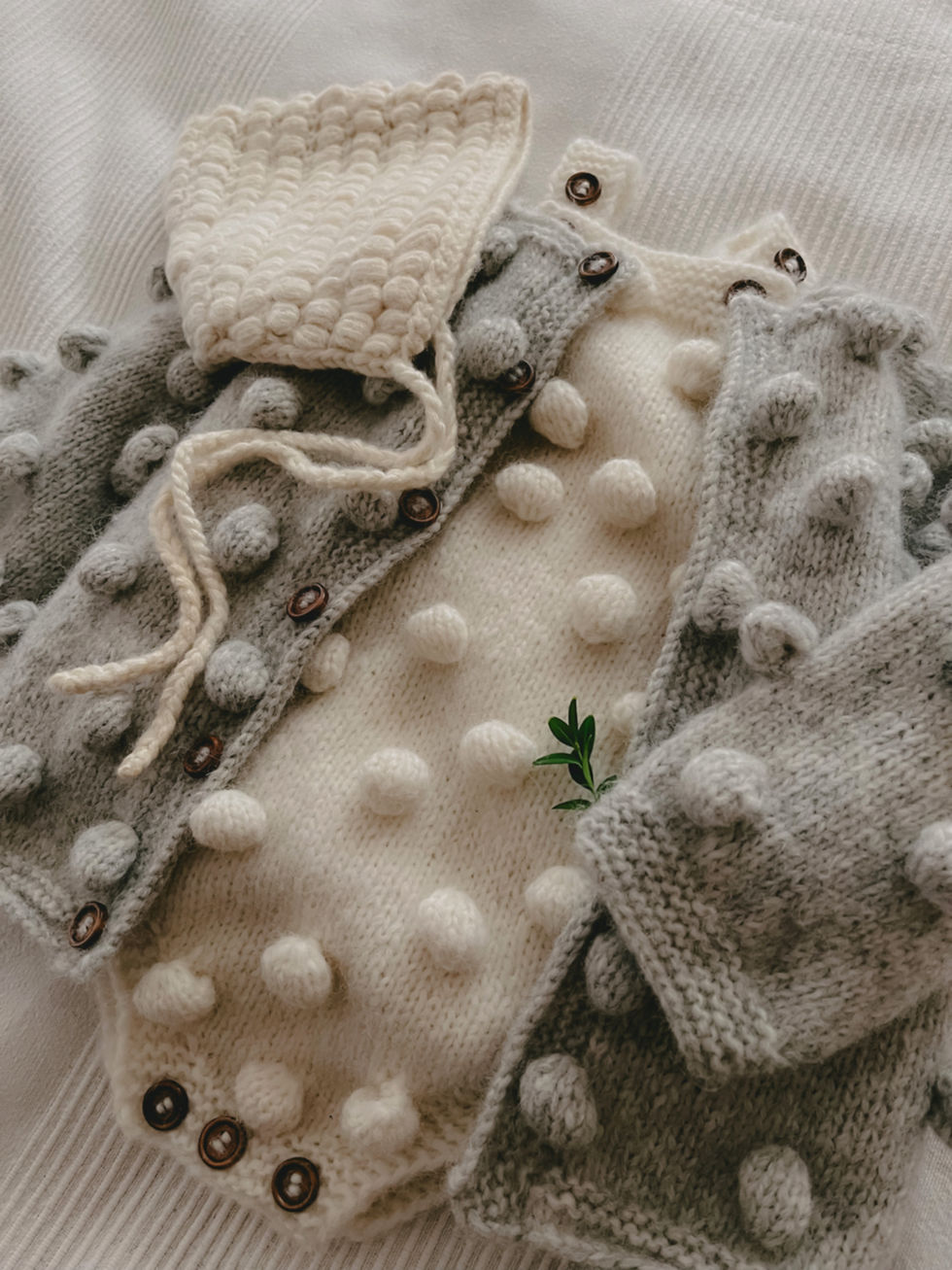 Thumbnail: Handknitted baby bubble popcorn alpaca cardigan unique handmade baby shower gift