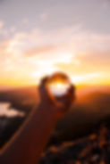 person-holding-a-glass-ball-1252893.jpg
