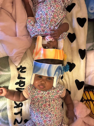 Fati and Mariem home with medical helmets