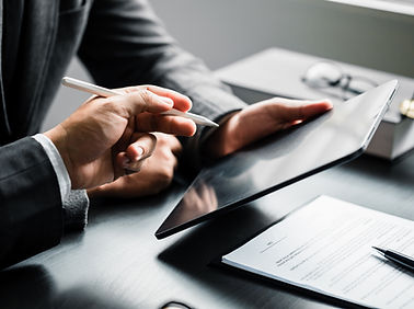 Close up of businessman or lawyers discussing about contract or business agreement at law