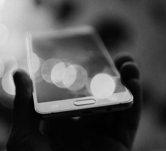 person holding smartphone_edited.jpg