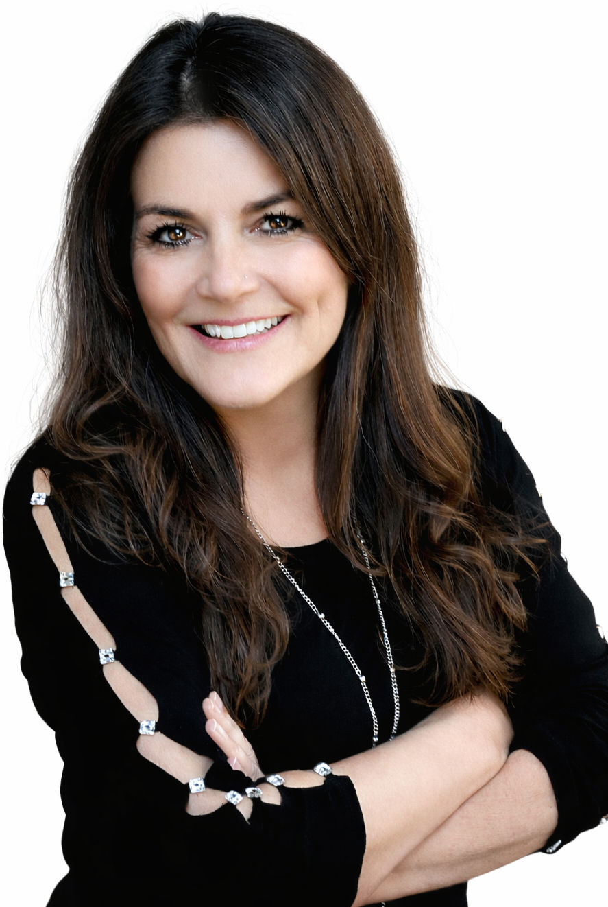 Smiling woman, Fileece King, with long dark hair and arms crossed.