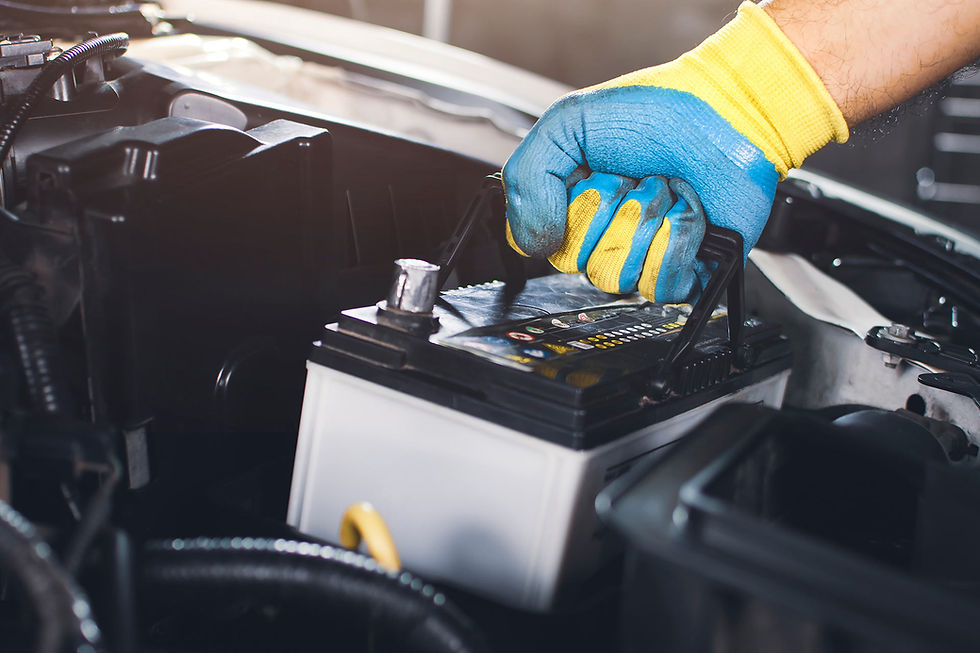 2technician-is-pulling-up-car-old-battery-replacement.jpg