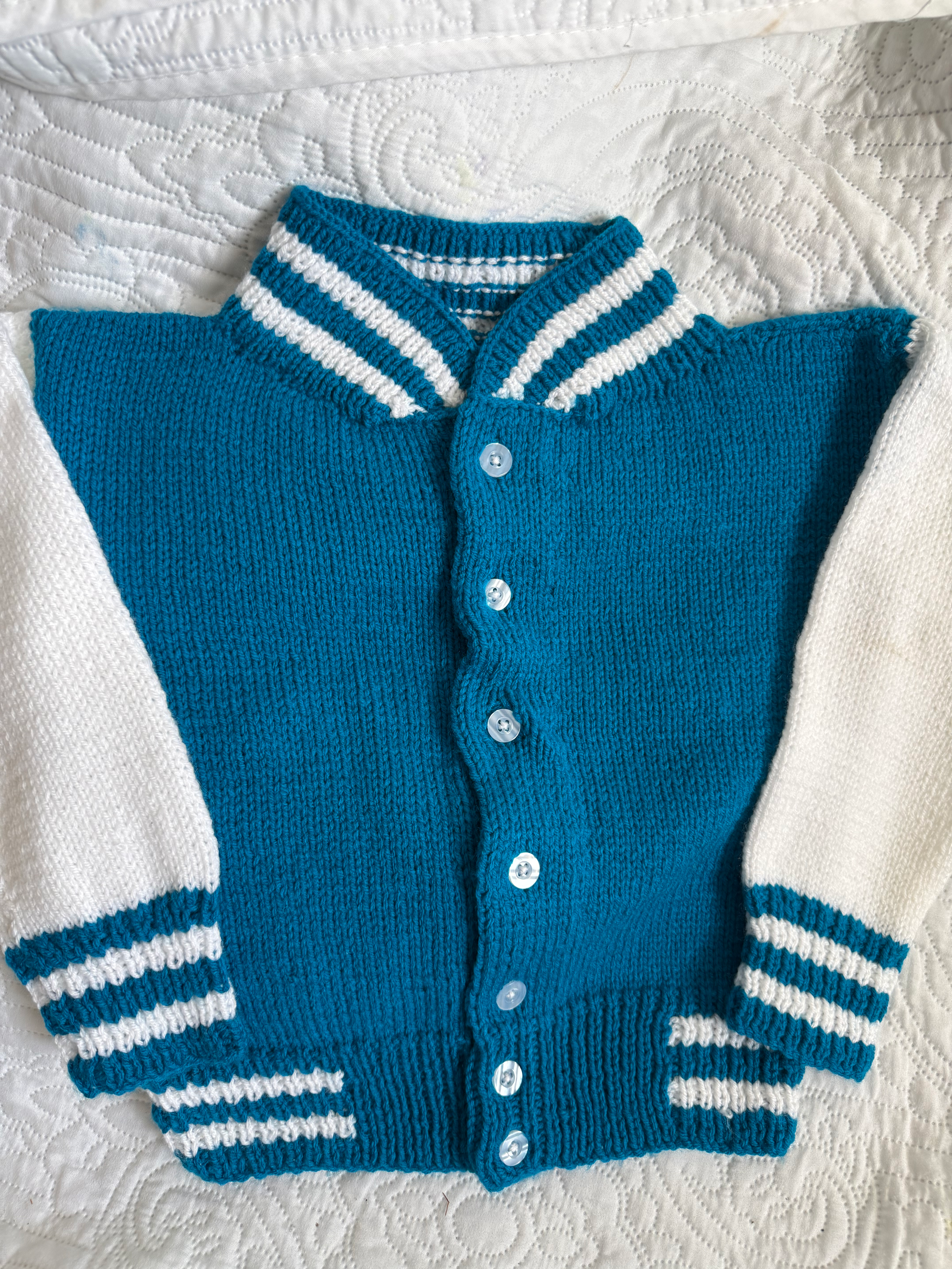 Hand knitted varsity style jacket 4-5years
