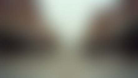 Eye-level view of Harlan’s Main Street with local shops and people walking