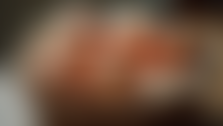 Close-up view of fresh farm eggs in a rustic basket