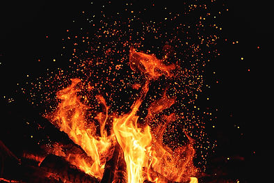 campfire-fire-flames-with-sparks-dark-background.jpg