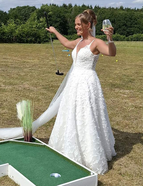 Bride playing mini golf1lq.jpg