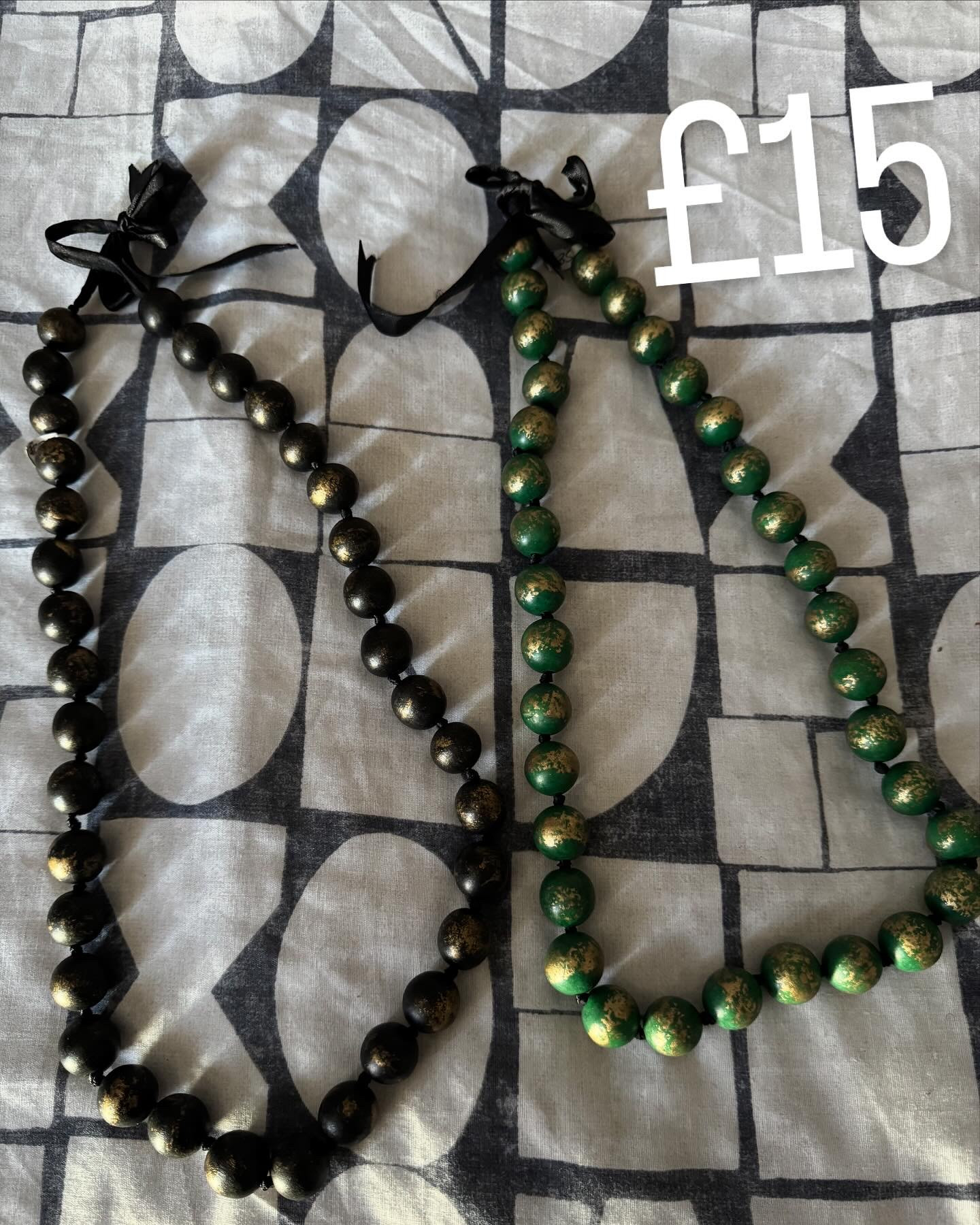Black and green necklace beats