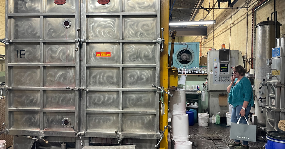 a very large dyeing vault with a person next to it for scale