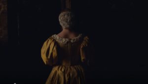 Nella in a yellow dress