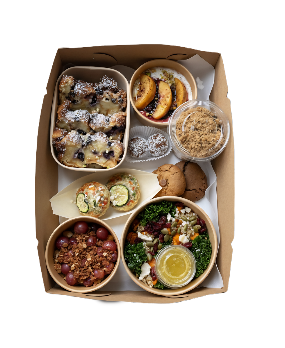 Meal kit with pastries, yogurt, granola, fresh salad, and cookies