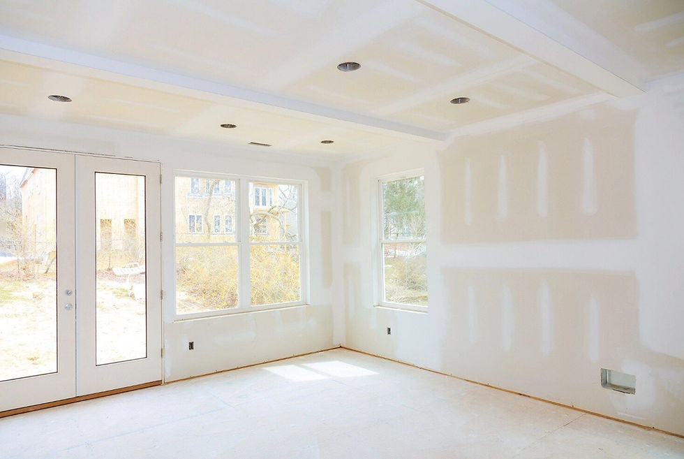 Drywall work is in progress inside a new home in Toronto