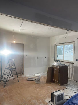 A kitchen renovation with drywall being finished by AJ Drywall, LLC