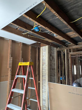 An older home being renovated by AJ Drywall, LLC with modern drywall