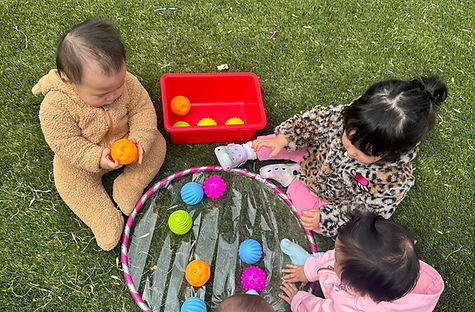 Babies playing in our Playground
