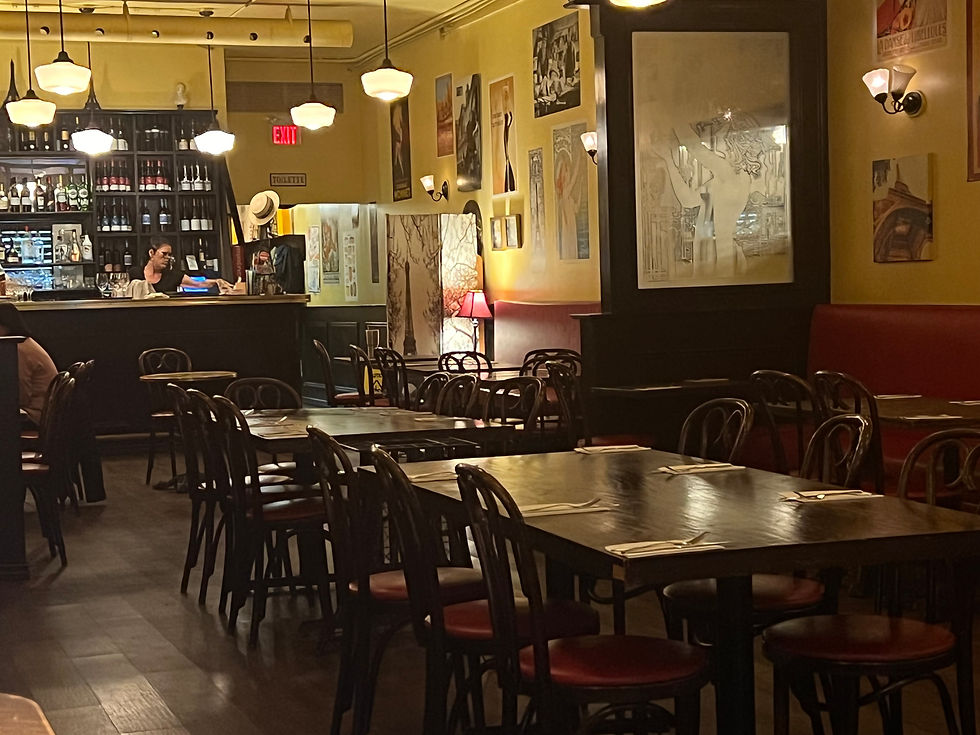 Eye-level view of a cozy Paris Crepes Cafe interior with rustic decor