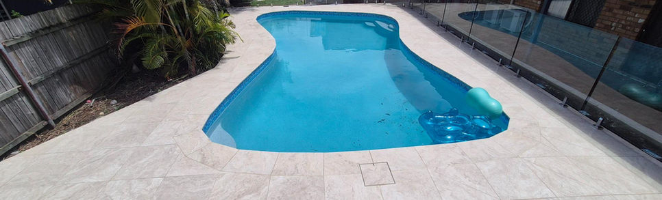 Premium pool surround tiling by Brisbane Tiling Service