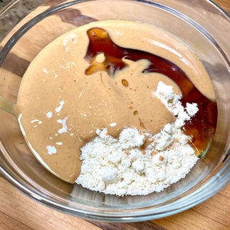 Ingredients in a bowl to make Flourless Peanut Butter Chocolate Bars