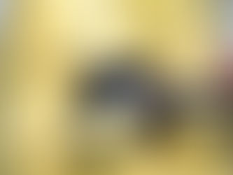 Pistachio ice cream scooped from the tray for serving