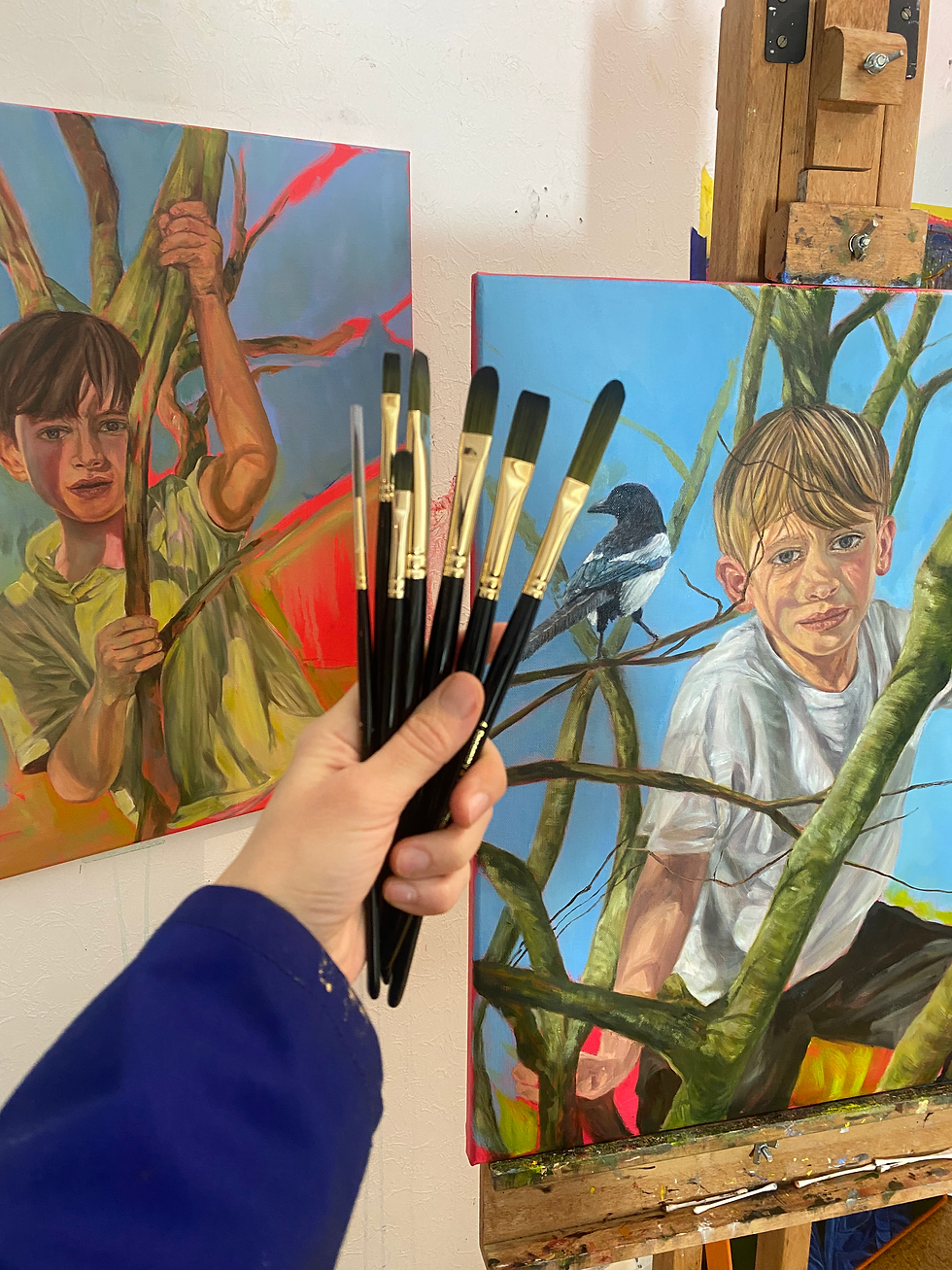Close-up view of a set of Rosemary paintbrushes arranged on a wooden table