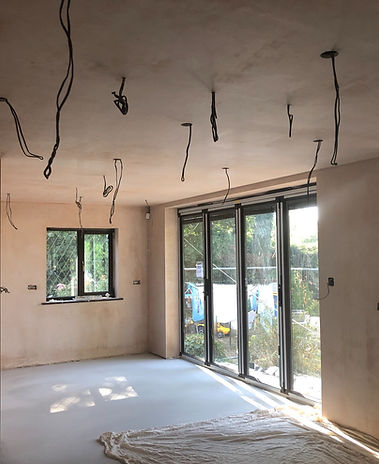 Adam's Painting site showing electrical wires on a ceiling.