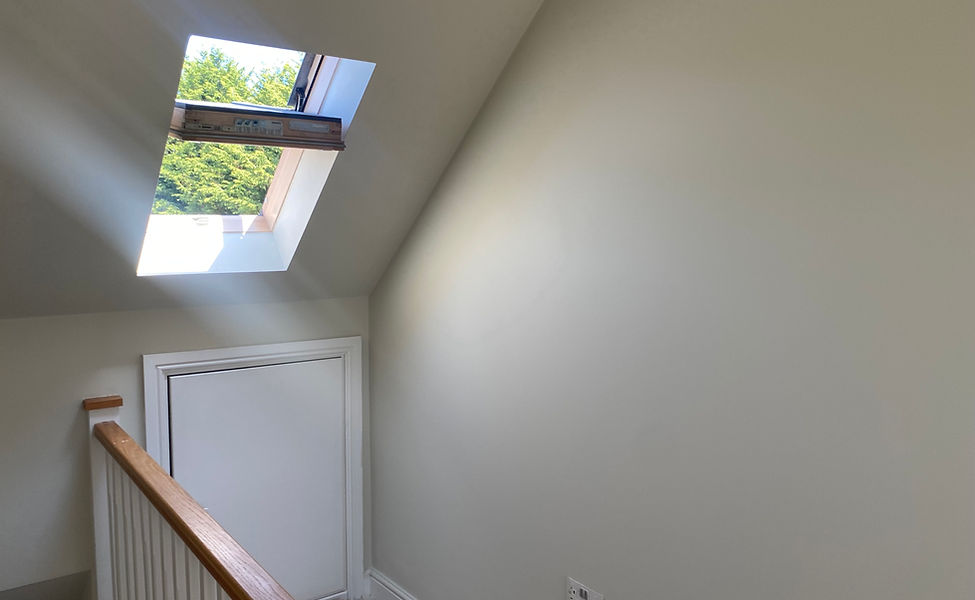 Interior wall with skylight finished by Adam's Painting