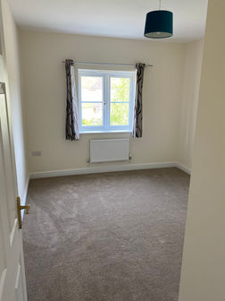 Freshly painted bedroom walls by Adam's Painting