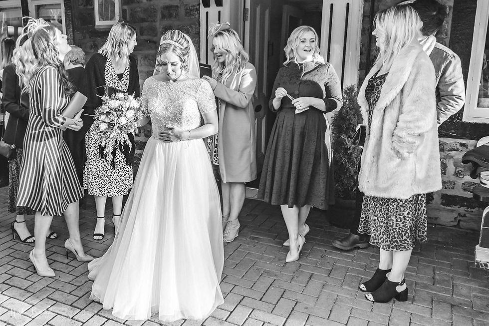 emotional bride after the wedding ceremony at the woodman inn Yorkshire leeds photographer