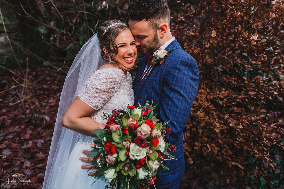 bride and groom portrait near trees and leaves at the woodman inn Yorkshire leeds photographer