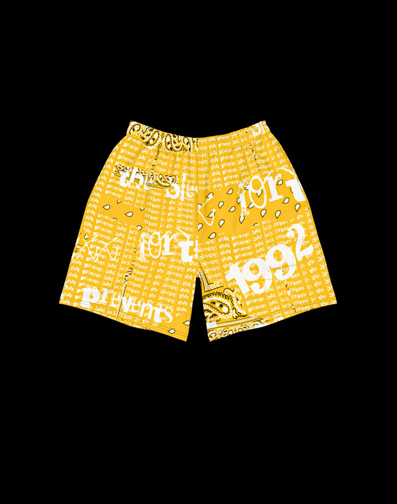 Streetwear Clothing - Premium sustainable graphic shorts in a yellow color.