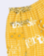 LEMON YELLOW SHORTS with bandana print, "fortune is the blessing that prevents bad luck" text.
