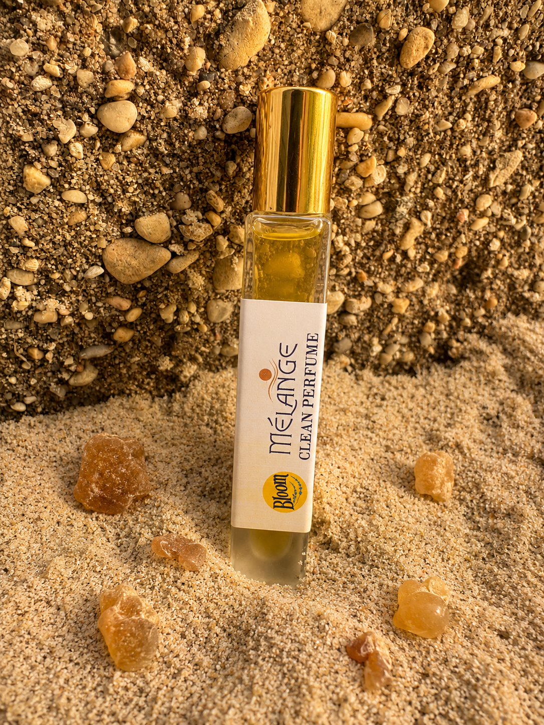 Mélange desert science fiction perfume with gold cap in sand and frankincense resin