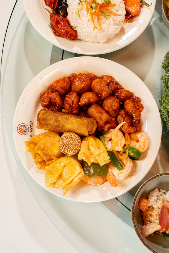 Delicious Asian buffet: shrimp, chicken, and dumplings