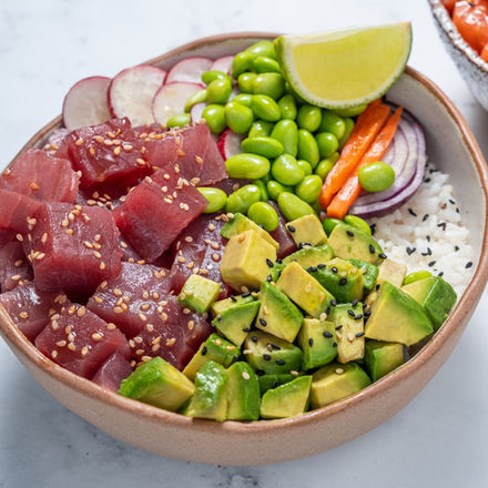 Tuna poke bowl with avocado, edamame, and rice
