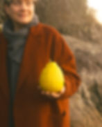 Chef Andrea Carlson holding a lemon