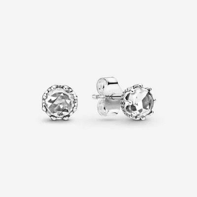 Two silver stud earrings with clear gemstone detail. Jewels by the Sea.