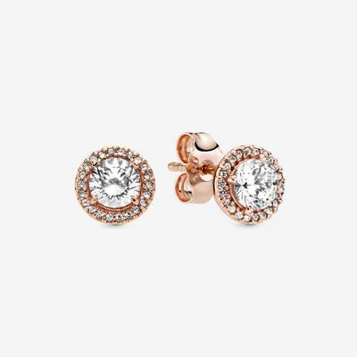 Rose gold halo stud earrings with clear center stones, jewels by the sea.