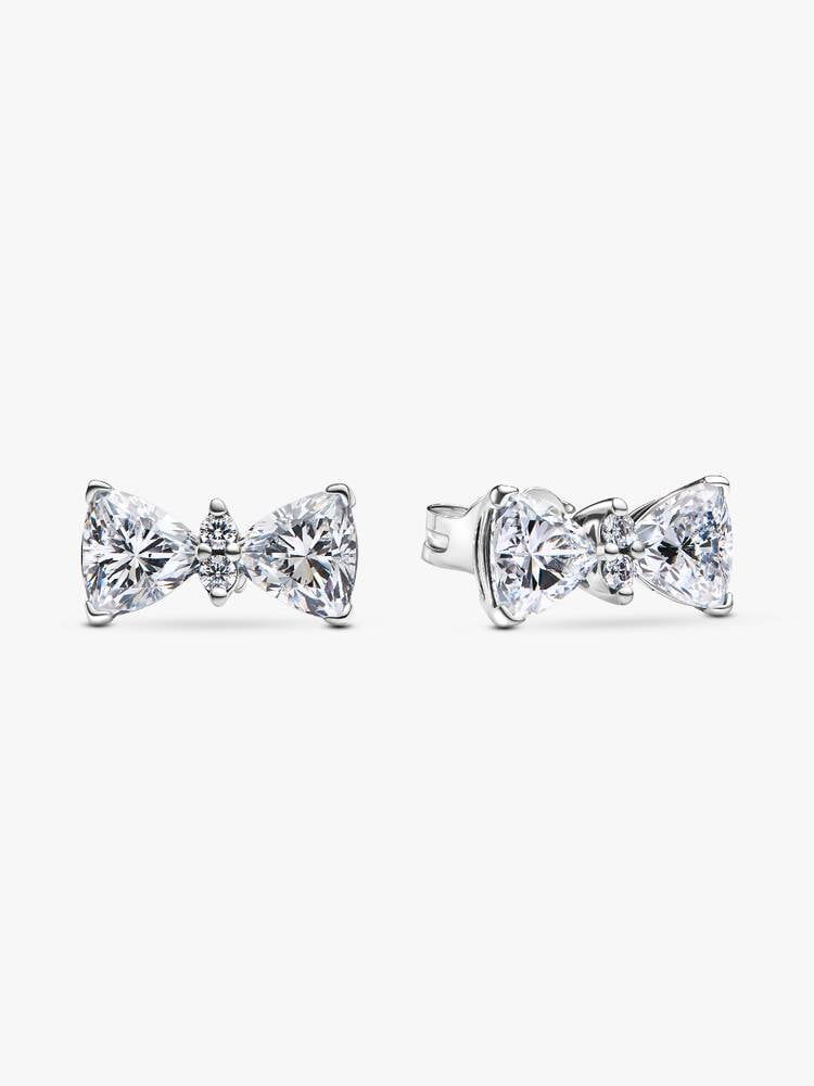 Sparkling bow-shaped earrings. Elegant, white, and dazzling, perfect for any special occasion. Jewels by the Sea