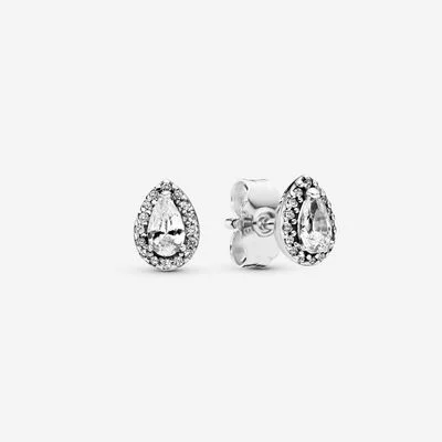 Pair of silver stud earrings with teardrop shape and sparkling stones.