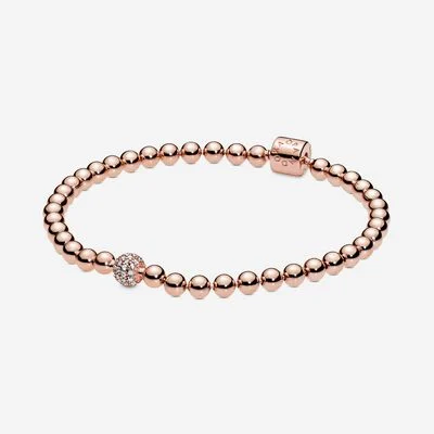 Rose gold beaded bracelet with a diamond accent and Jewels by the Sea.