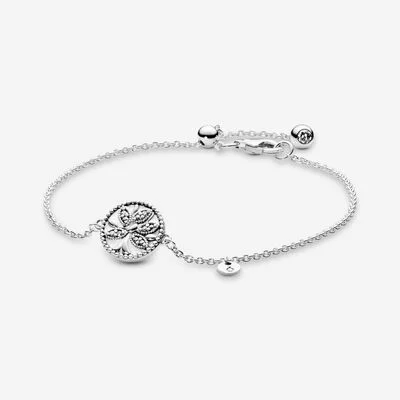 Silver bracelet with tree pendant, delicate design, on white background, Jewels by the Sea.