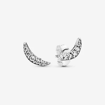 Moon-shaped stud earrings featuring sparkling pavé stones, accessories on white background.