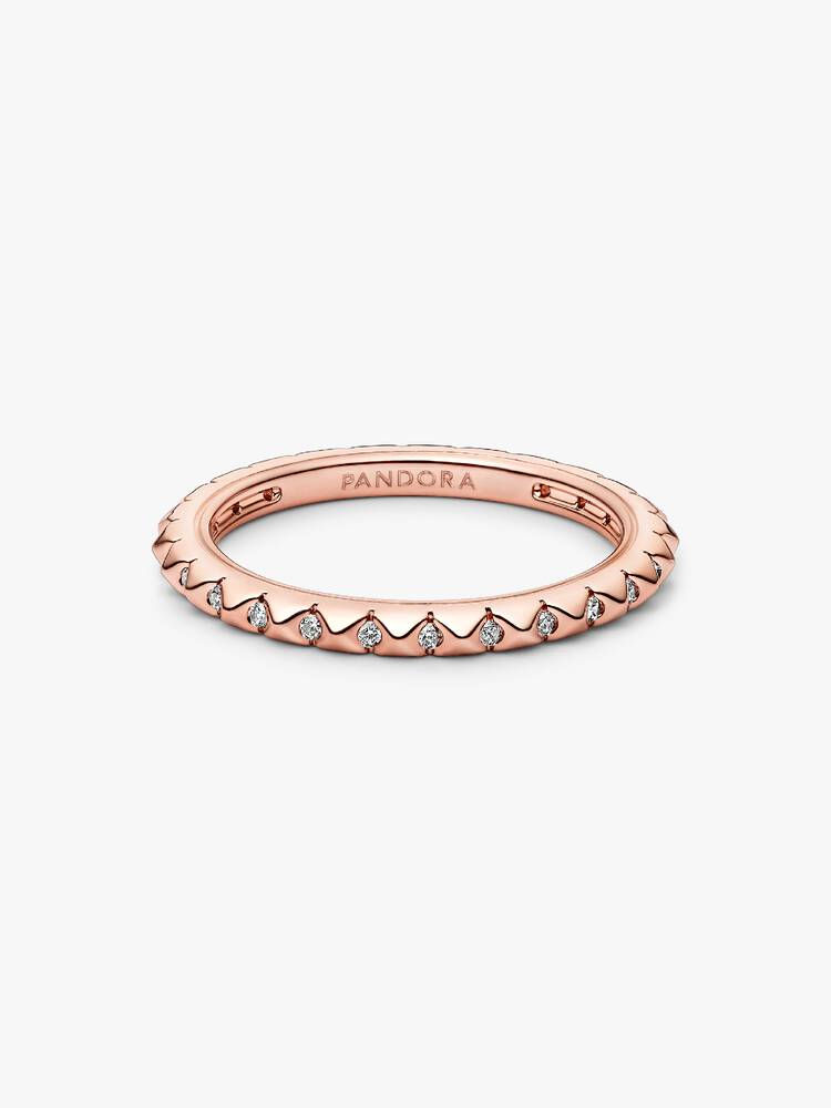Pandora rose gold ring with small diamonds and the word Pandora visible.