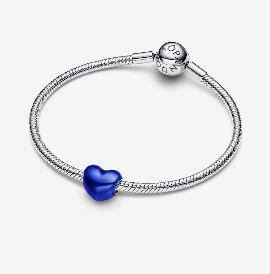 Silver Pandora bracelet with a blue heart charm, simple and elegant design.