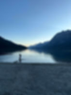 A peaceful evening at a scenic BBQ spot near Silvaplana, offering stunning views of the Upper Engadine lakes and the silhouette of the surrounding mountains.