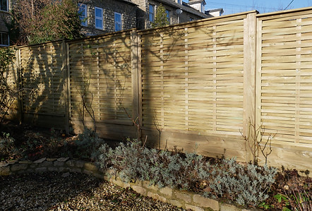 Woven Panel Fencing With Double Gravel Board - Pinewood Fencing