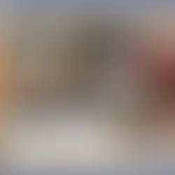 Homemade bone broth simmering with marrow bone, onions, and herbs in preparation for nourishing postpartum recovery meals.